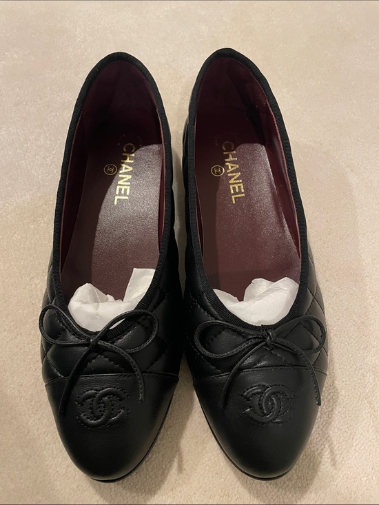 CHANEL Shoes - CHANEL Black Quilted Leather Ballet Flats with Bow